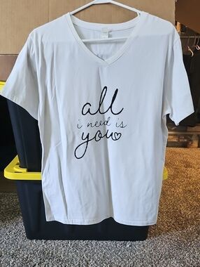 White V-neck Tee with "all i need is you" Script